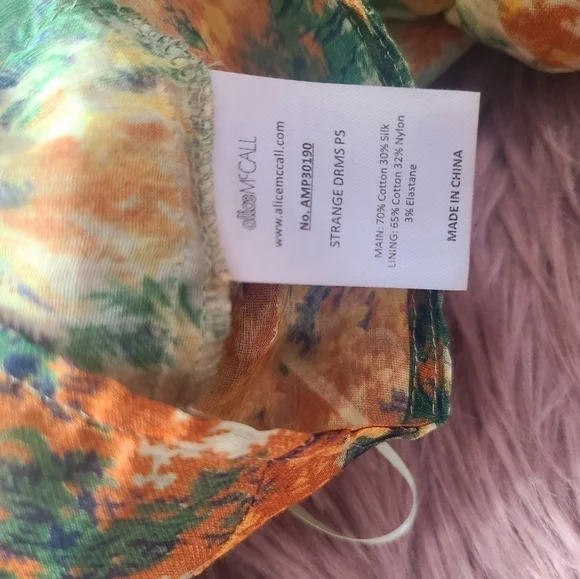 Strange Dreams Playsuit without the belt.Price is Firm or Best Offer.